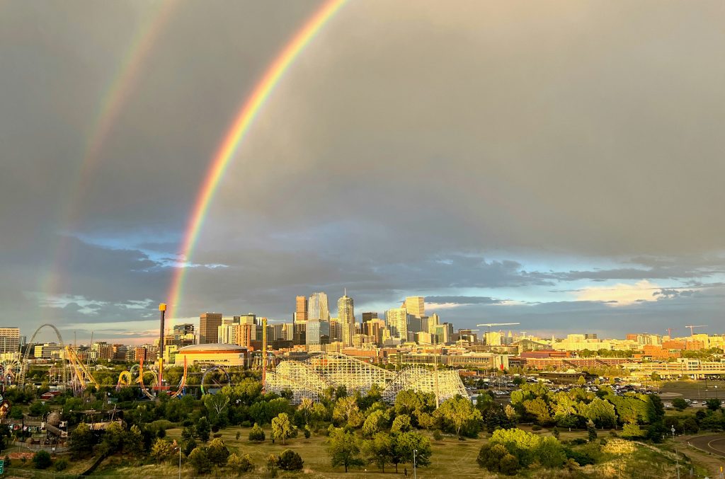 A rainbow over the Denver skyline