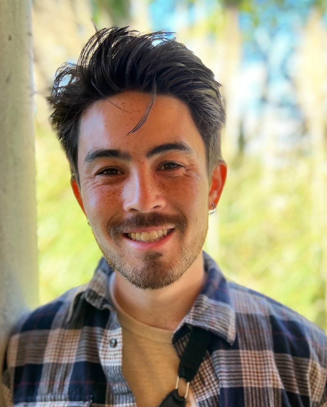 Headshot of OWSI staff member Dylan Kojimoto